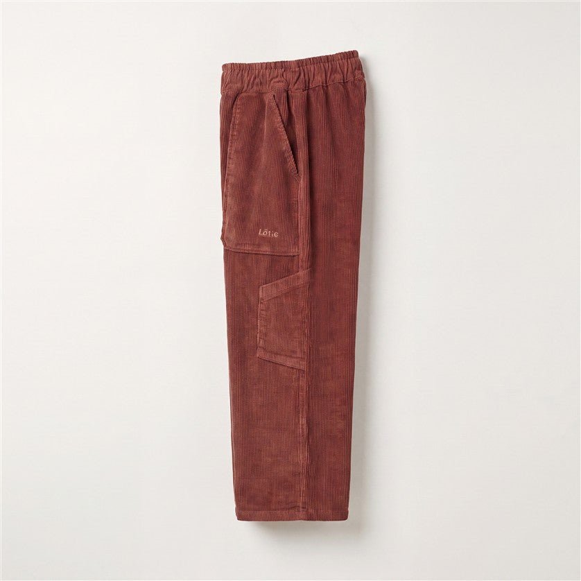 Wijde corduroy kinderbroek in washed brown.