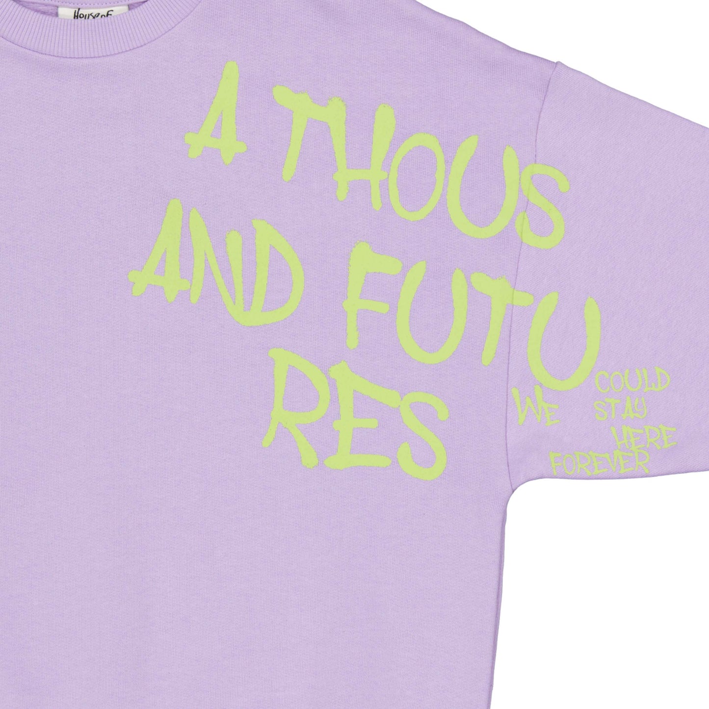 detail opdruk in neon groen op sweater edwig