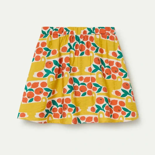 Ecru kinderrokje met all-over print van citrusvruchten van Compañia Fantástica