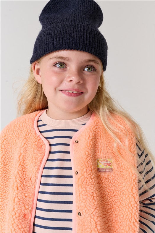 Trendy teddy gilet voor meisjes in warme koraalkleur.