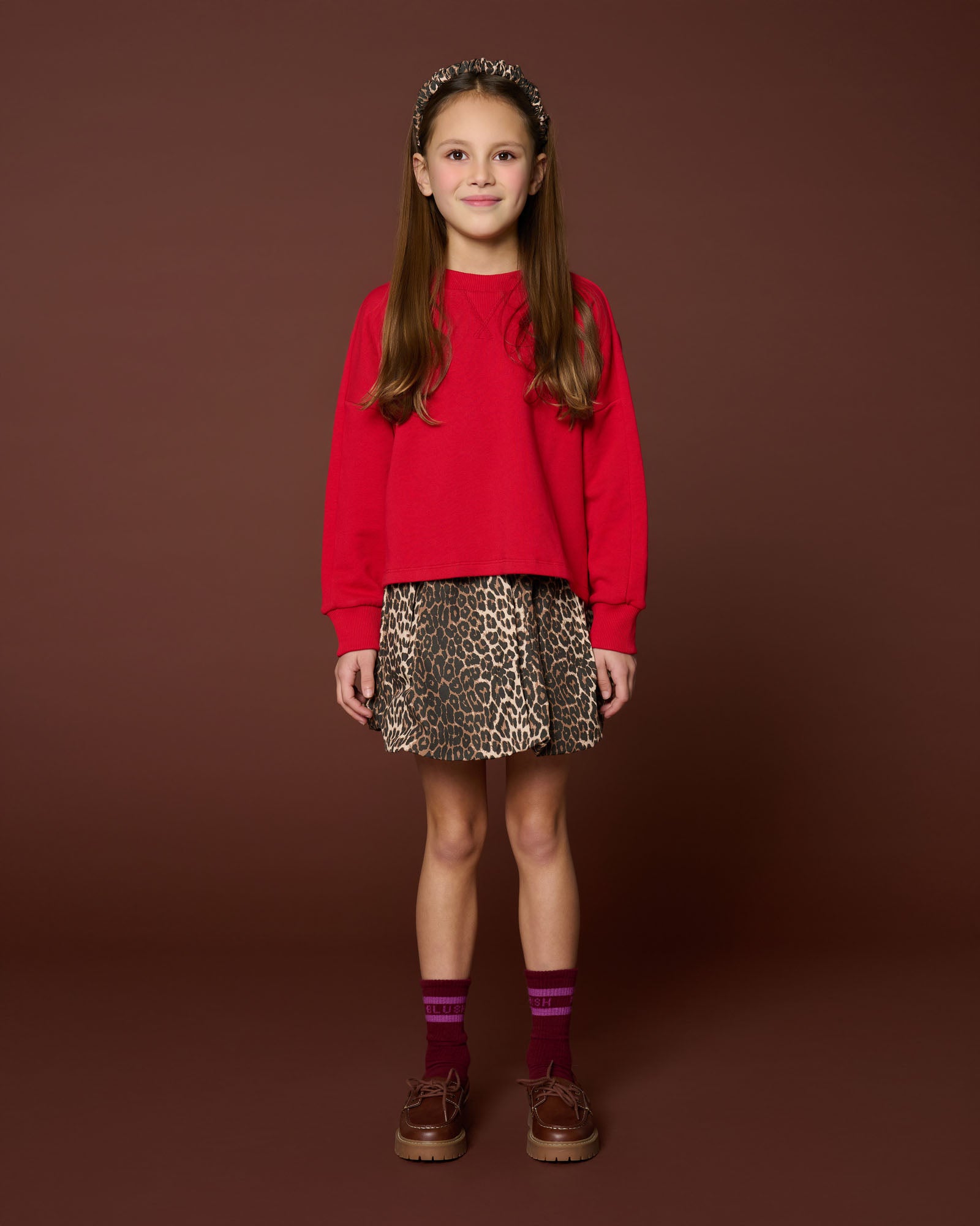 meisje draagt ballon skirt leopard van petit blush vooraanzicht