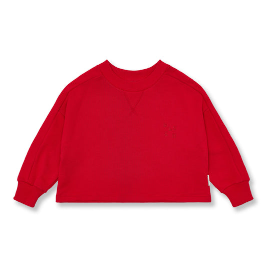 Rode korte kindersweater met wijd model in salsa kleur van petit blush