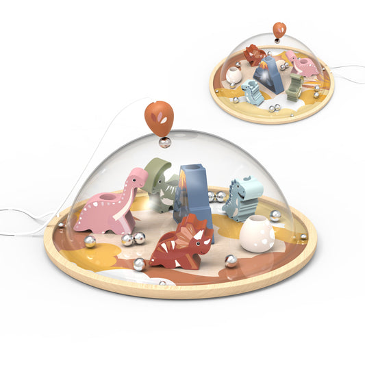 Magnetisch spel met dinosaurussen en vulkaan.
