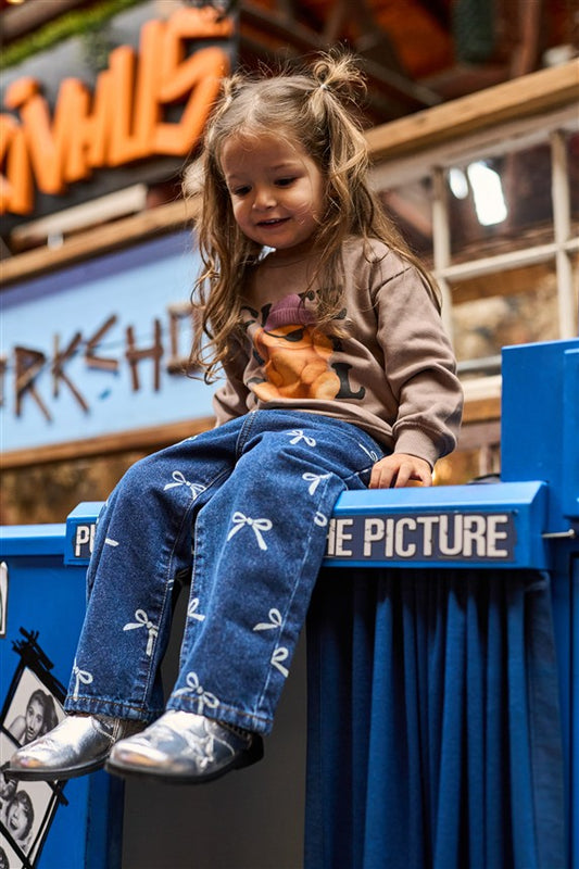 Blauwe jeans voor peuter meisjes met strikjesprint.