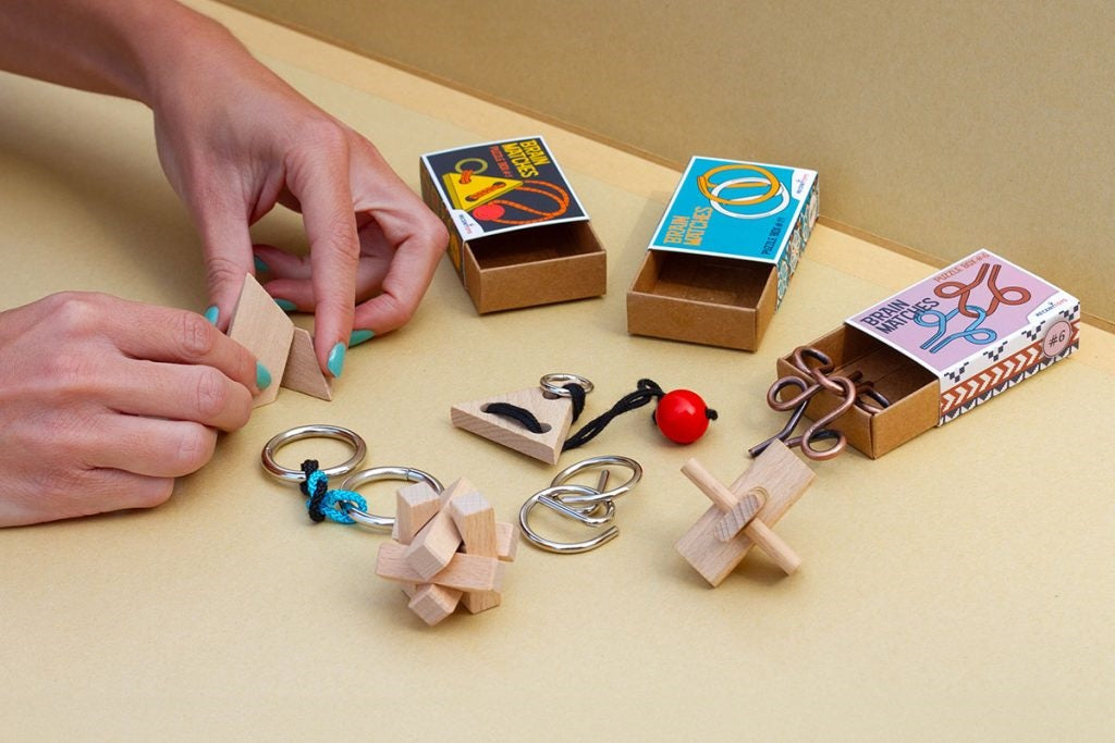 Houten en metalen denkpuzzels van Recent Toys