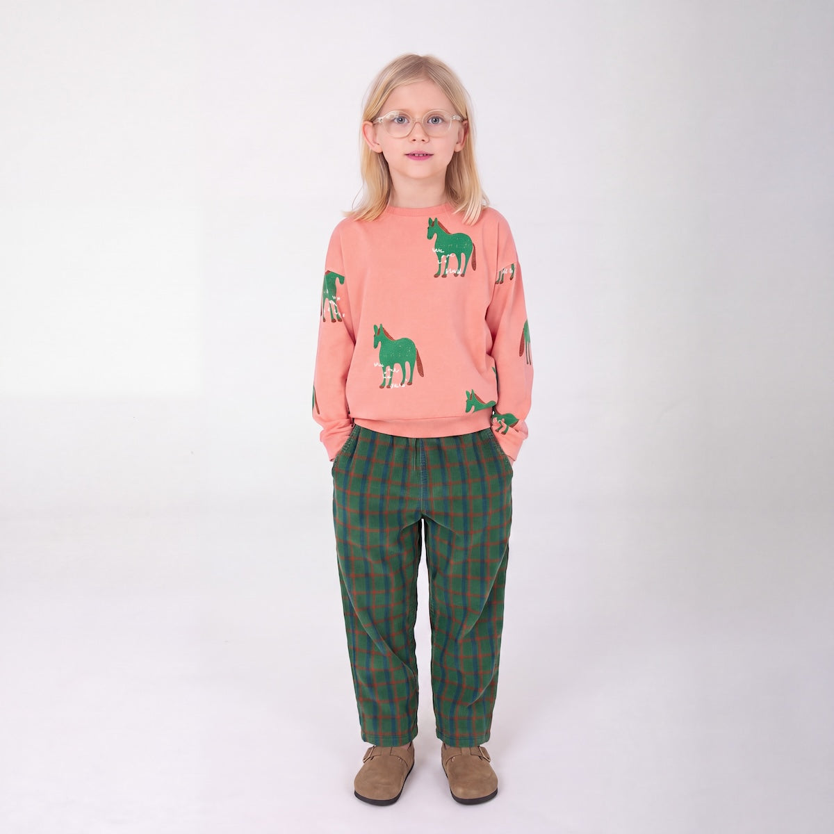Wijde groene corduroy broek voor kinderen.