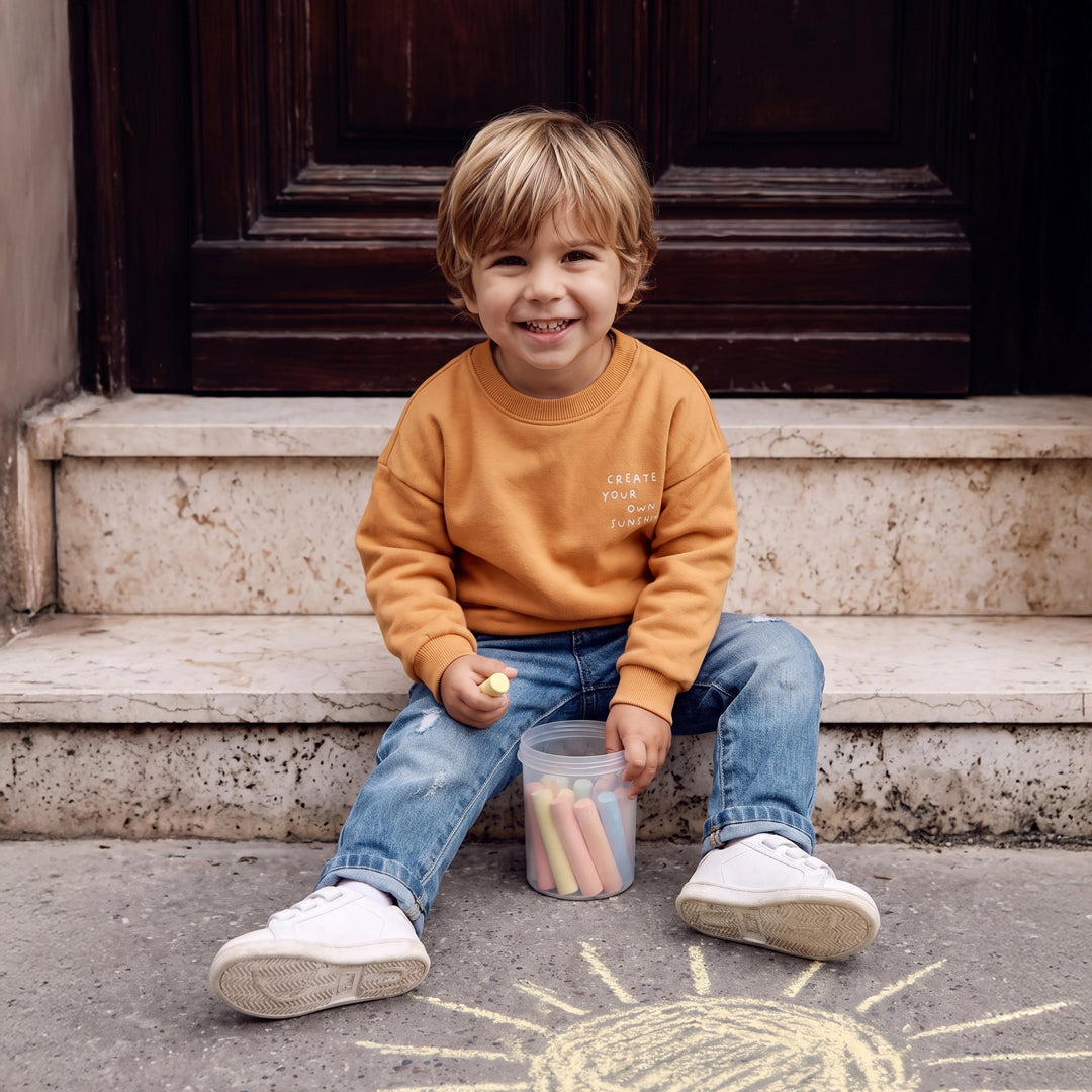 Sweater met Create Your Own Sunshine.