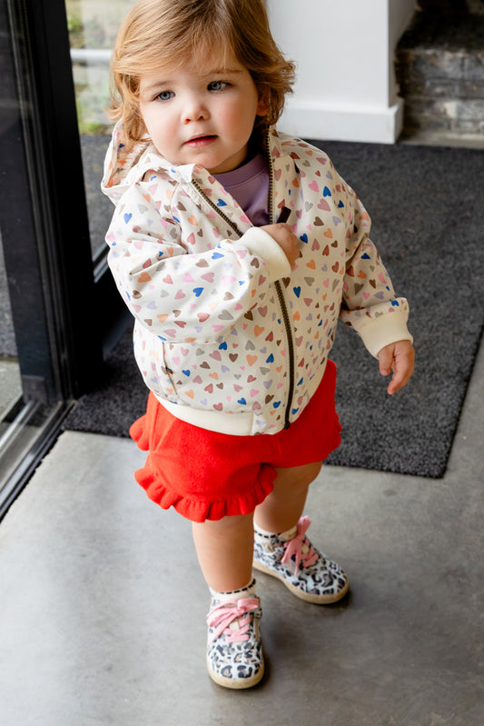 Kind draagt bomber jacket Haerts