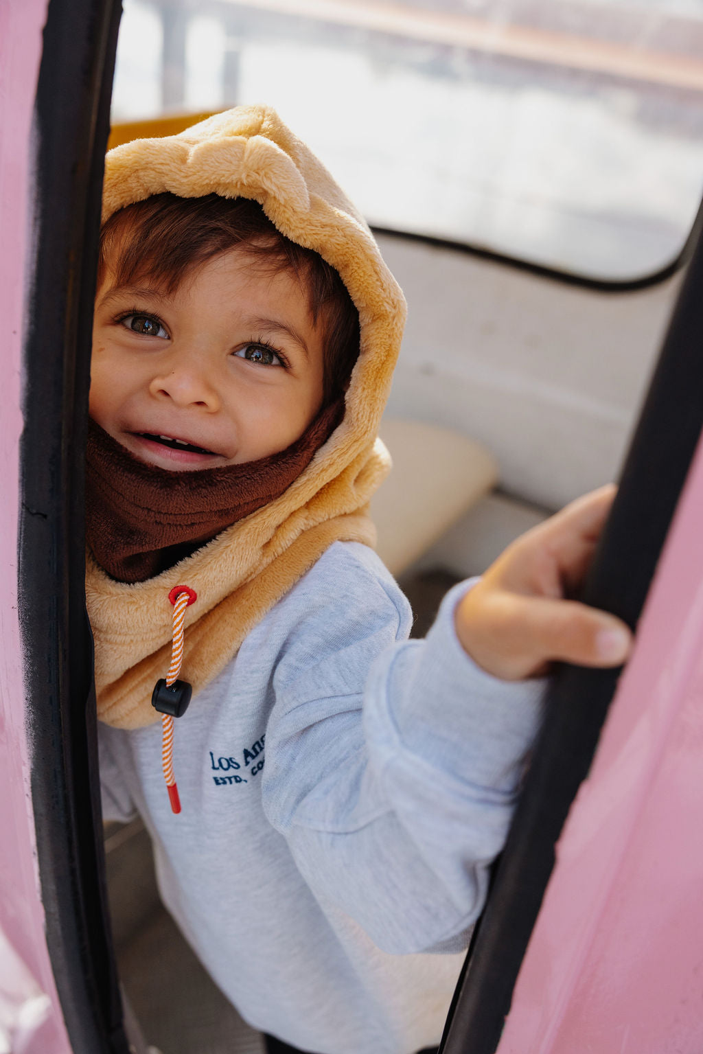Warme balaclava voor kinderen in neutrale kleuren.