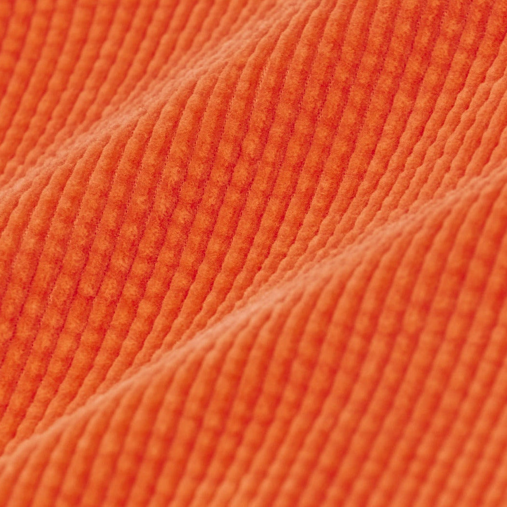 detail van de stof van dress orange voor baby