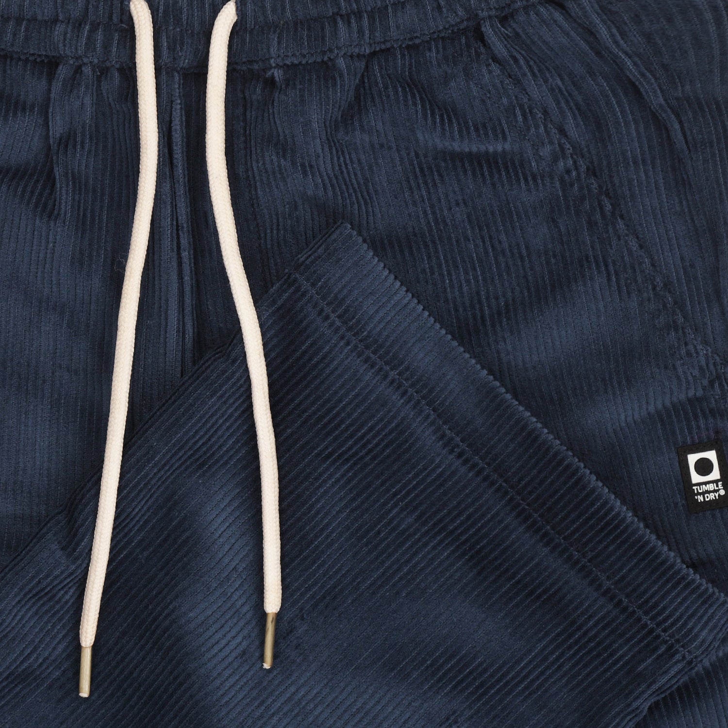Jongensbroek van ribfluweel in donkerblauw.