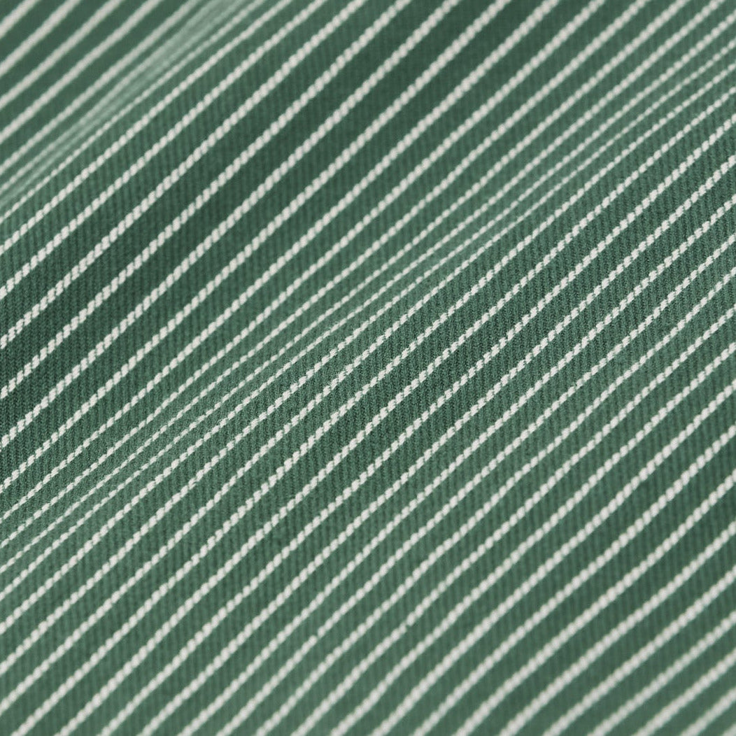 detail stof broek groen gestreept