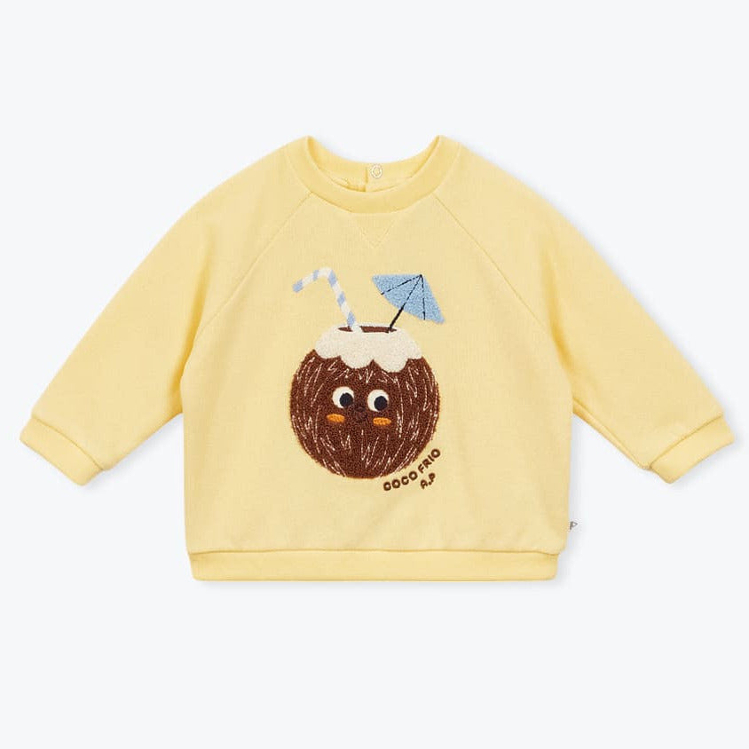 Zachtgele kinder sweater met geborduurde kokosnoot van Arséne & les Pipelettes