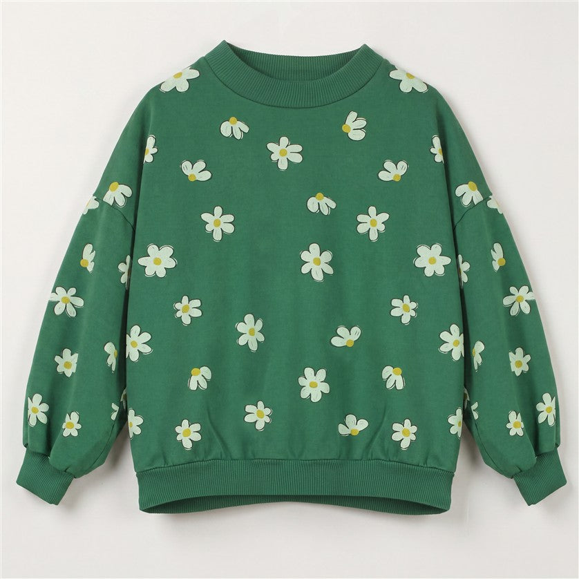 Groene meisjes sweater van Lötiekids met all-over madeliefjesprint.