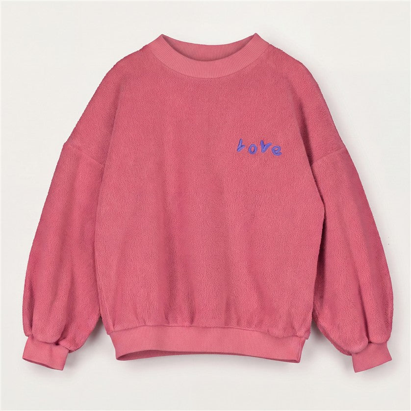 Roze teddy velours sweater voor kinderen met geborduurde LOVE tekst.
