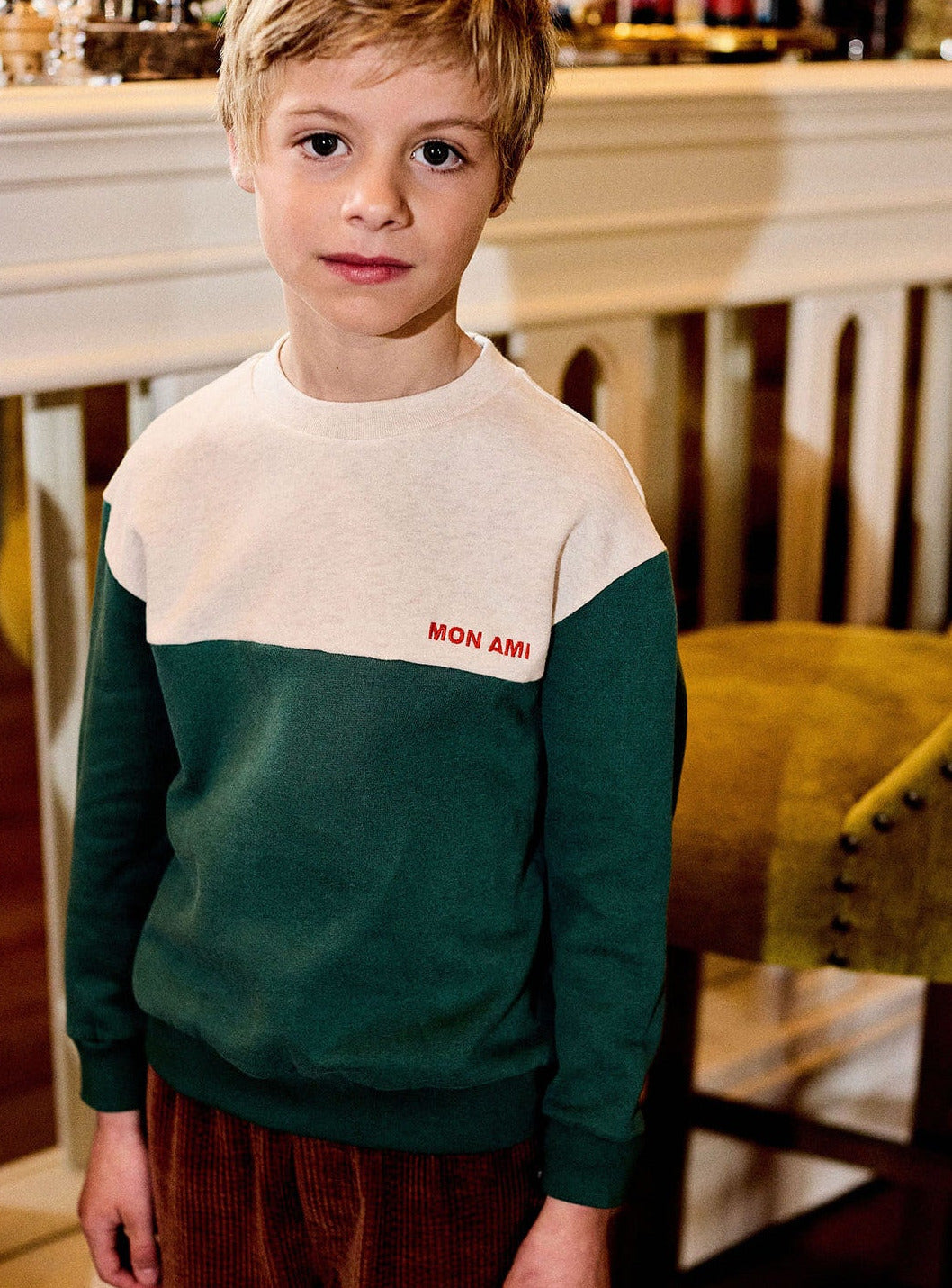 jongen draagt sweater two tone van arséne