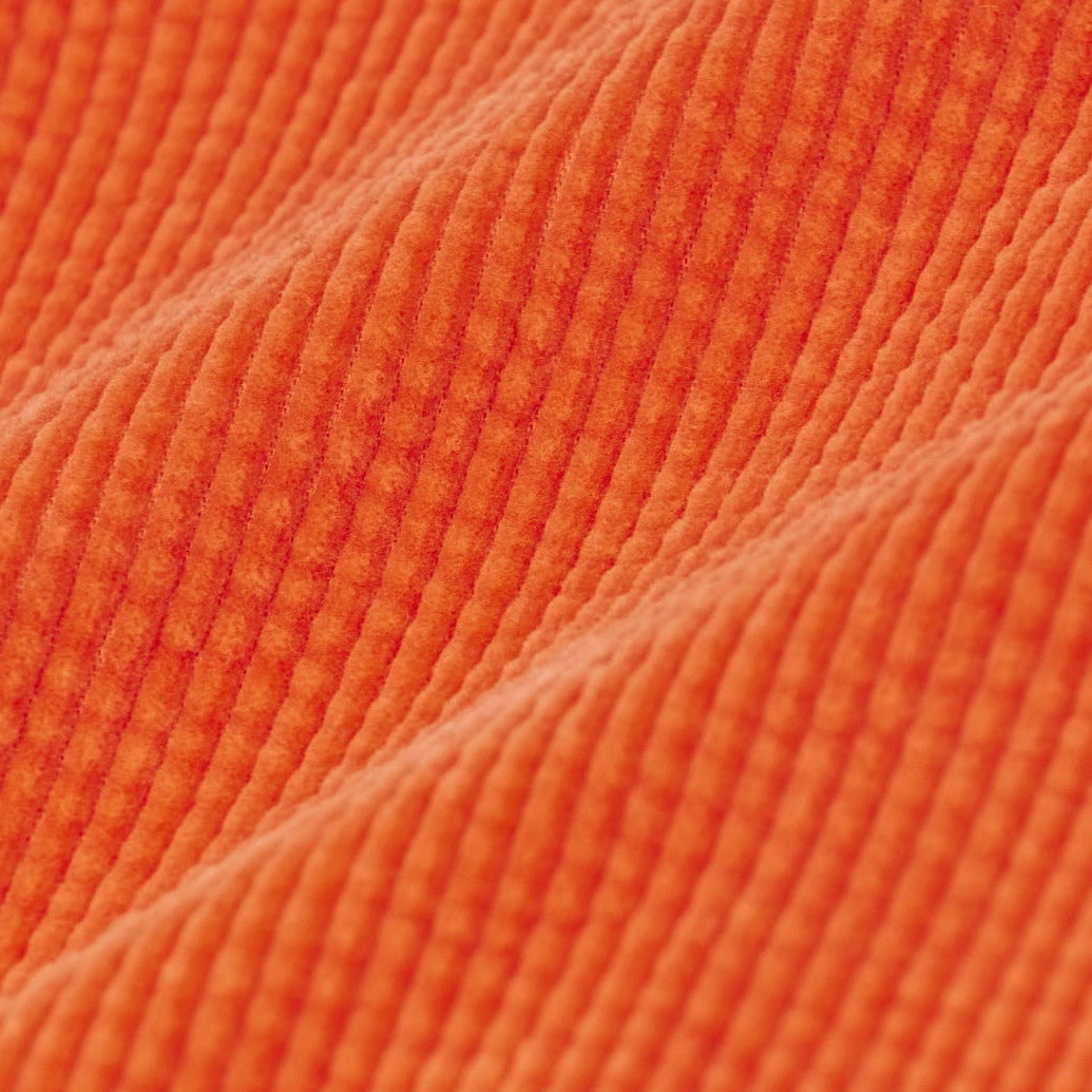 oranje stof in ribfluweel