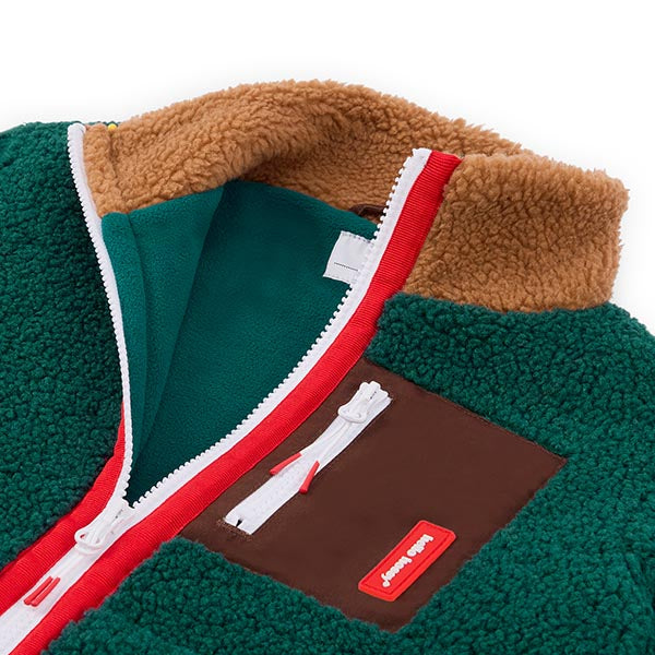 Zacht teddy vest in lichtblauwe kleur met ritssluiting.