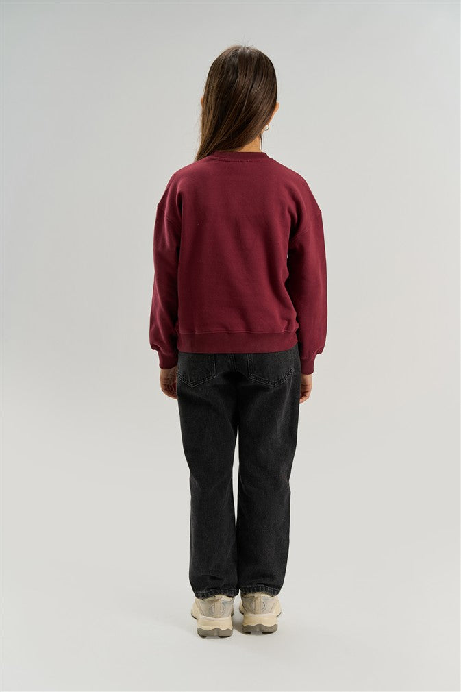 Comfortabele rode sweater voor meisjes met statement print.