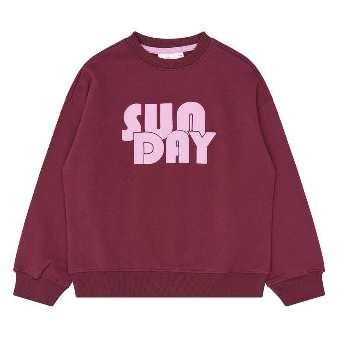 Bordeauxrode sweater voor meisjes met SUN DAY opdruk van the new