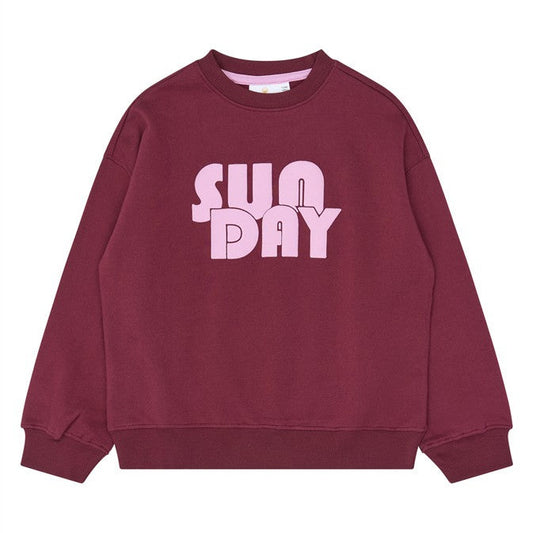 Bordeauxrode sweater voor meisjes met SUN DAY opdruk van the new