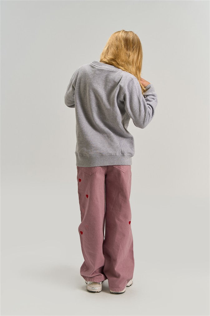 Comfortabele meisjes sweater met speelse dierenprint.